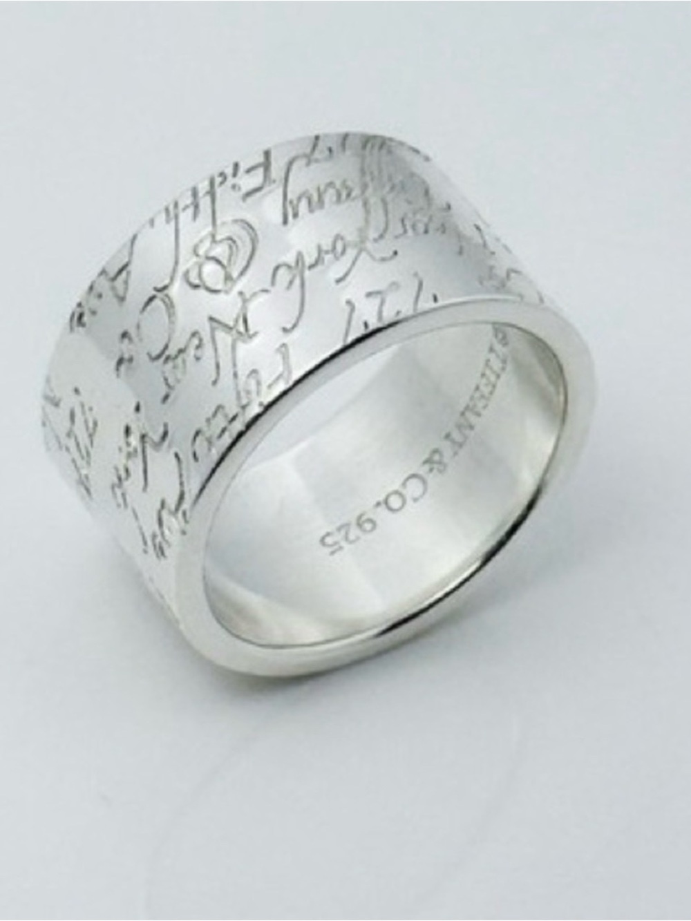 Tiffany & Co. Wide Notes Band Sterling Script Wide Band Ring - Silver